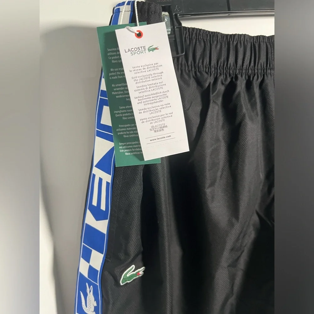 LACOSTE Athletic Pull-on Fully Lined Shorts w/side pockets & Logo Side Bands - Picture 10 of 16